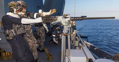 Japan Maritime Self-Defense Force's Rear Admiral Kazushi Yokota, Commander, Escort Flotilla 3, fires the .50 calibre machine gun on board HMAS Warramunga during Exercise Kakadu 24. Story by Lieutenant Marie Davies. Photo by Leading Seaman Iggy Roberts.