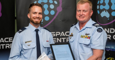 Corporal Ryan Hodson, left, receives The Corporal Margaret Clarke Award from Warrant Officer of the Air Force Ralph Clifton at an awards ceremony held at Russell Offices, ACT. Photo by Flight Sergeant Kev Berriman.