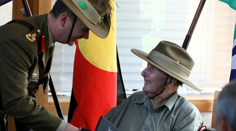 Commander 9th Brigade Brigadier Tim Orders presents World War 2 veteran, Glen Dobie, with his Australian Service Medal 1945-75 with Clasp 'PNG'. Story and photos by Captain Peter March.