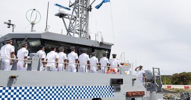 The ship's company of HMTSS Te Matailii III man the upper decks as the national flag of Tuvalu is raised for the first time during the Guardian-class patrol boat handover ceremony at Fleet Base West in Western Australia. Photo by Able Seaman Connor Morrison.