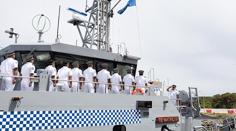 The ship's company of HMTSS Te Matailii III man the upper decks as the national flag of Tuvalu is raised for the first time during the Guardian-class patrol boat handover ceremony at Fleet Base West in Western Australia. Photo by Able Seaman Connor Morrison.