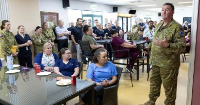 Lieutenant Colonel Stephen Jenkins, staff officer at Headquarters 1st (Australian) Division, thanks staff at the Enoggera Health Centre, Gallipoli Barracks, Brisbane, after his recovery from cancer. Story and photos by Captain Peter Nugent.