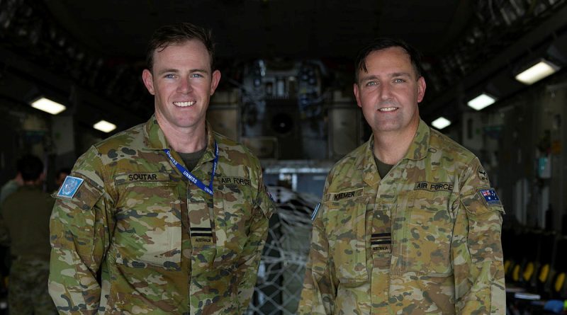 UN peacekeepers RAAF Flight Lieutenant Grant Soutar, left, and Squadron Leader Dean Kremer, deployed on Operation Aslan, stand inside a 36 Squadron C-17 Globemaster at Juba International Airport, South Sudan. Story and photos by Corporal Jacob Joseph.