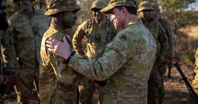 Chief of Army Lieutenant General Simon Stuart talks with North-West Mobile Force patrolman Private Kamahl Korrabubba from Centre Squadron in Alice Springs. Story and photos by Corporal Michael Rogers.