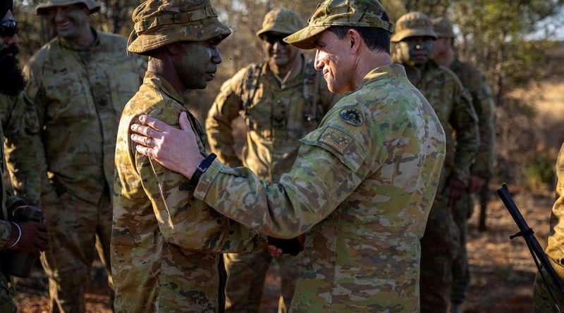 Chief of Army Lieutenant General Simon Stuart talks with North-West Mobile Force patrolman Private Kamahl Korrabubba from Centre Squadron in Alice Springs. Story and photos by Corporal Michael Rogers.