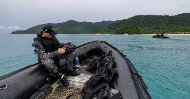 Navy’s Clearance Diving Team Four uses the Artemis underwater navigation sonar unit during a seabed training search at Palau Tioman, as part of Exercise Bersama Lima. Photos by Corporal Lisa Sherman.