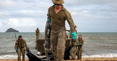 Army petroleum operator Private Mason Dearing prepares to transport fuel from an LCM-8 to the beach storage area in the vicinity of Cowley Beach Training Area, Queensland. Story by Captain Joanne Leca.