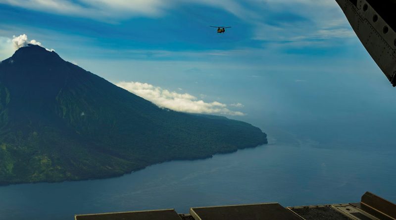 A CH-47F Chinook from 5th Aviation Regiment flies over Karkar Island during Exercise Helicon Luk in PNG. Story by Major Carolyn Barnett. Photos by Warrant Officer Class Two Miranda Buckley.