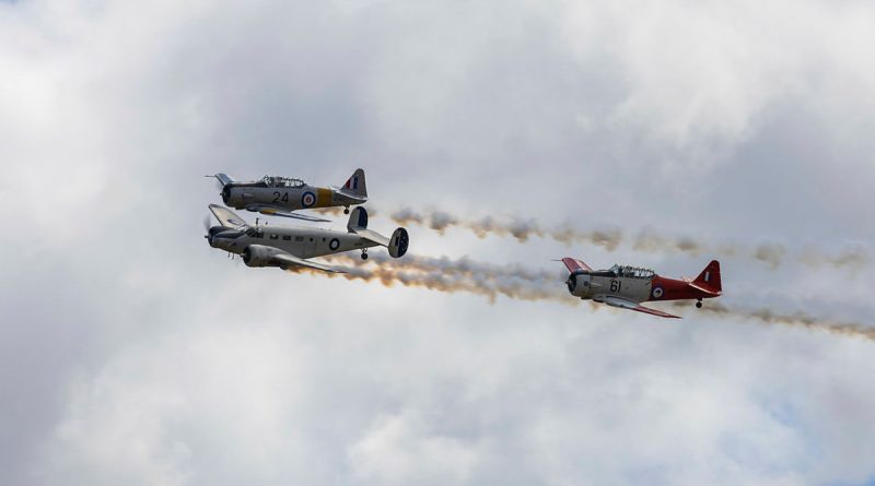 A civilian Beechcraft D18S and two civilian T-6 Harvards fly in formation at Warbirds Downunder in Temora, NSW. Story by Flight Lieutenant Imogen Lunny. Photos by Leading Aircraftwoman Paris Rigney.