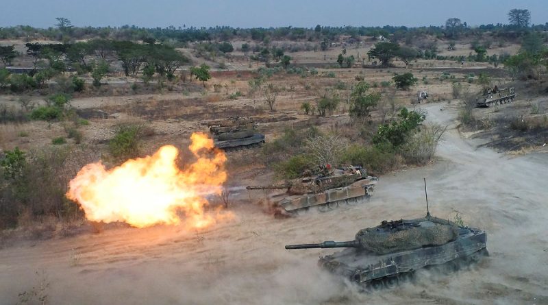 An Australian Army M1A1 Abrams fires while working side-by-side Indonesian National Armed Forces Leopard 2 tanks during a combined joint live-fire practice on Exercise Keris Woomera 2024 in East Java, Indonesia. Story by Lieutenant Commander Gary McHugh. Photo by Leading Seaman David Cox.