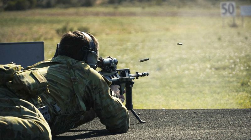 A soldier fires his weapon during the Simpson Trophy shooting competition, held at the Murray Bridge Training Area, South Australia. Story by Captain Peter March. Photos by Private Jack Kleinig.