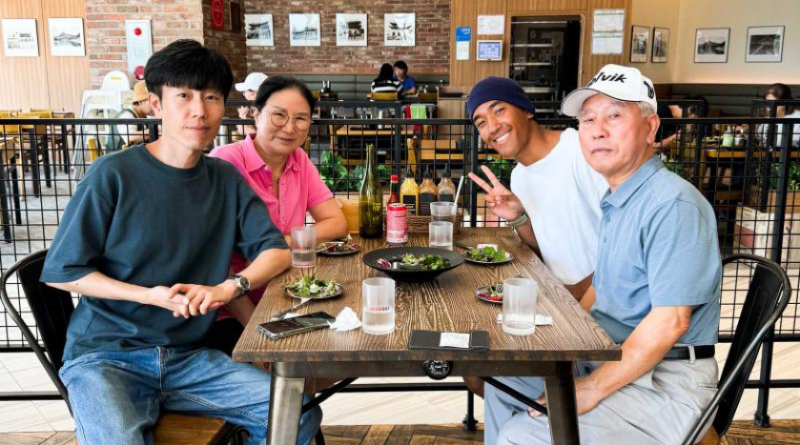 Able Seaman Brenton Manuel, back right, meets his grandparents for the first time as HMAS Sydney is berthed alongside Busan, Republic of Korea, during a regional presence deployment. Story by Lieutenant Tahlia Merigan.