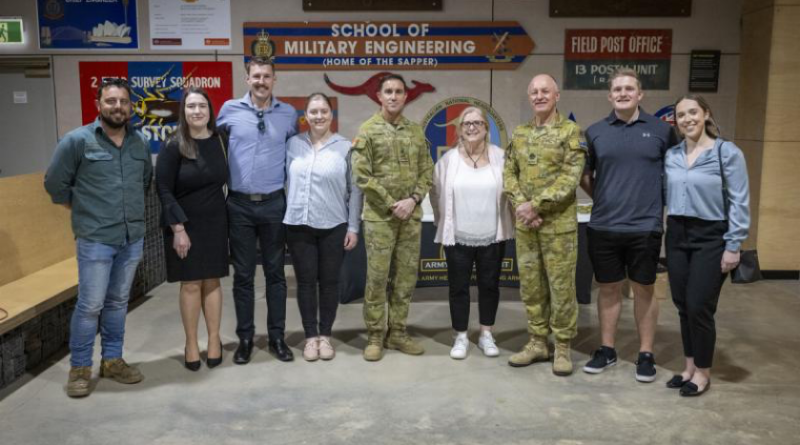 Warrant Officer Class One Frank Franolic, right of centre, stands with friends and family after being presented with his third Federation Star. Story by Captain Carlie Gibson. Photo by Warrant Officer Class Two David Eason.