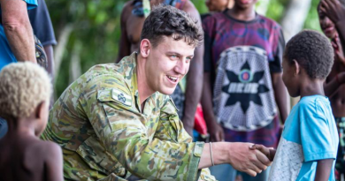 Australian Army Jonathan Church Good Soldiering Award recipient Lieutenant Lachlan Maill meets local villagers in Rabaul, PNG, during a historical battle tour. Story and photos by Corporal Melina Young.