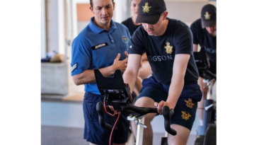 Corporal Matthew Johnson watches over a recruit trialing the new fitness test standard Wattbike at RAAF Base Wagga, NSW. Story by Pilot Officer Timothy Sullivan. Photos by Aircraftman Jakob Reid.