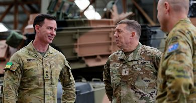 US Army Major General Glenn Dean, centre, speaks with Commanding Officer Army School of Electrical and Mechanical Engineering Lieutenant Colonel Tim Soper, left, during the Abrams M1A2 main battle tank maintainer course at Gaza Ridge Barracks, Bandiana, Victoria. Story by Captain Krysten Clifton. Photos: bySergeant Andrew Sleeman.