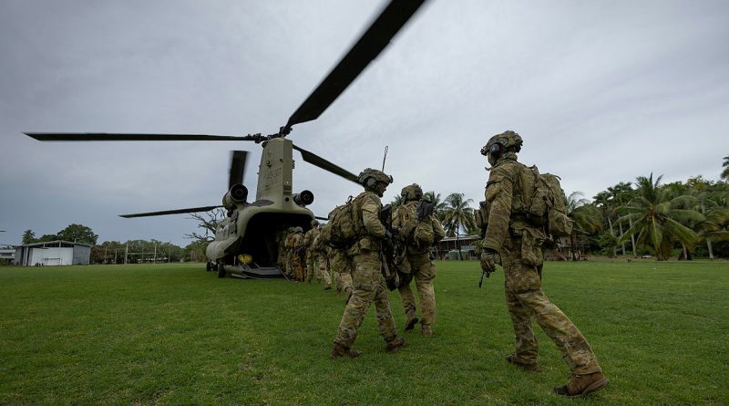 Soldiers from 3rd Battalion, the Royal Australian Regiment, and the PNG Defence Force board a CH-47 Chinook from 5th Aviation Regiment during Exercise Wantok Warrior. Story by Captain Brittany Evans. Photo by Corporal Brandon Grey.