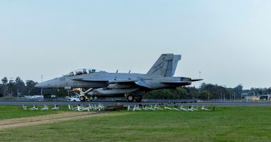 A RAAF EA-18G Growler lands using a Mobile Aircraft Arrestor System to demonstrate its capabilities at RAAF Base Amberley, Queensland. Story by Bruce Chalmers. Photo by Aircraftman Nell Bradbury.