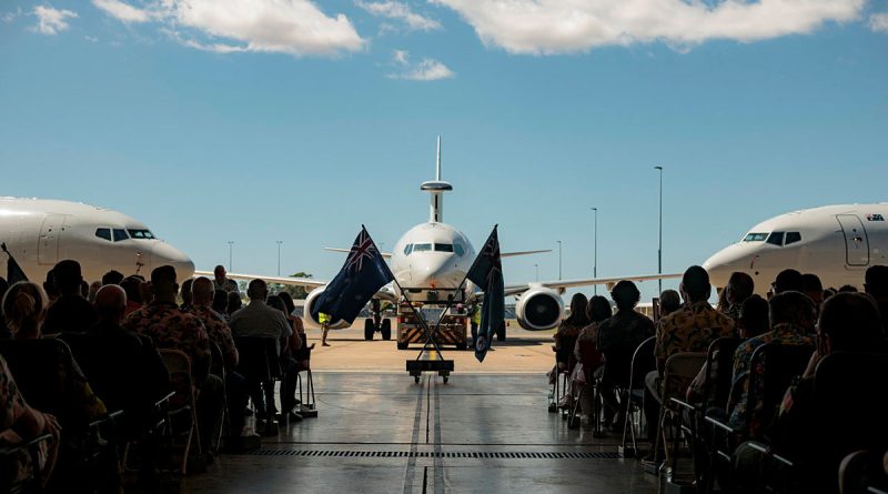 Attendees of a memorial service for the late Wing Commander Peter Krieg with a static display of E-7A Wedgetail aircraft at 2 Squadron, RAAF Base Williamtown. Story by Flight Lieutenant Grace Casey-Maughan. Photos by Aircraftwoman Laura Flower.