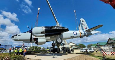 Two cranes return Neptune A89-280 back onto its plinth at the RAAF Base Townsville entrance. Story by Flight Lieutenant Julia Ravell.