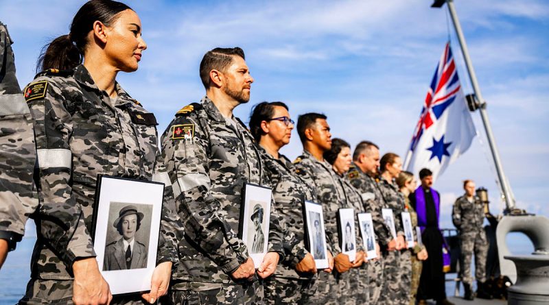 Nursing officers at the Bangka Island Massacre memorial service on board HMAS Adelaide hold photos of those who lost their lives in 1942. Story by Commander Steven Grosser. Photos by Leading Seaman David Cox.