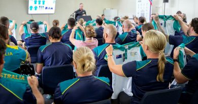 The Invictus Games 2025 Team Australia competitors receive the new team polo shirt during a uniform unveiling event at the Australian Institute of Sport, Canberra. Story by Flying Officer Belinda Barker. Photos by Flight Sergeant Christopher Dickson.