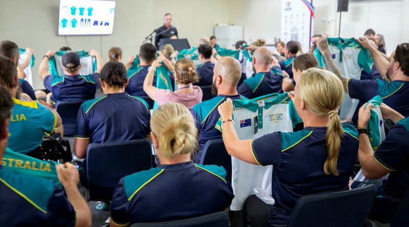 The Invictus Games 2025 Team Australia competitors receive the new team polo shirt during a uniform unveiling event at the Australian Institute of Sport, Canberra. Story by Flying Officer Belinda Barker. Photos by Flight Sergeant Christopher Dickson.