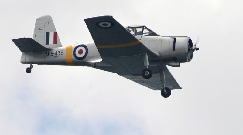 Wing Commander Aarian Birch pilots his CAC Winjeel from 100 Squadron at Point Cook over the cliffs of Point Addis during the 80th commemoration of the ditched RAAF Mitchell Bomber in 1944. Story by Flying Officer Rose Gigliotti. Photo by Warrant Officer Don Kenny.