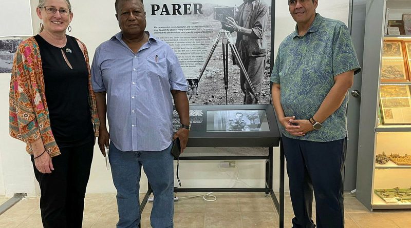 Ambassador to the Republic of Palau Richelle Turner, left, with the Governor of Peleliu Emais Roberts and Republic of Palau President Surangel Whipps Jr, at an exhibition of the life of Damien Parer. Story by Lieutenant Geoff Long.