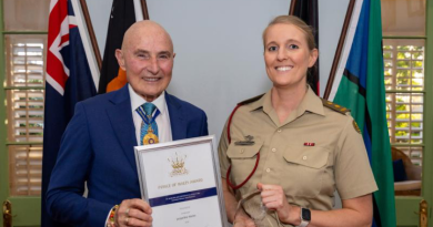 Administrator of the NT Hugh Heggie presents a Prince of Wales Award to 2024 recipient Lieutenant Jacqueline Martin during a ceremony held at Government House, Darwin. Story by Emily Egan. Photo by Petty Officer Leo Baumgartner.