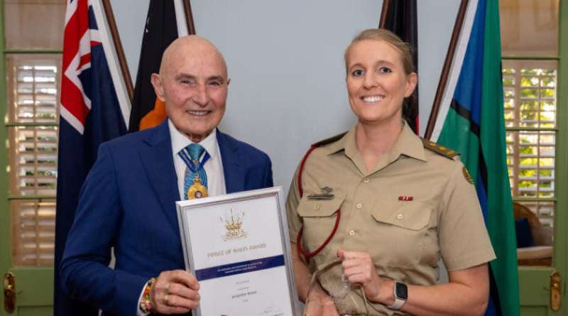 Administrator of the NT Hugh Heggie presents a Prince of Wales Award to 2024 recipient Lieutenant Jacqueline Martin during a ceremony held at Government House, Darwin. Story by Emily Egan. Photo by Petty Officer Leo Baumgartner.