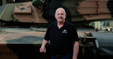 Andrew McAdie stands with the new M1A2 main battle tank at Bandiana North Barracks, Victoria. Story by Captain Krysten Clifton. Photo by Corporal Andrew Sleeman.