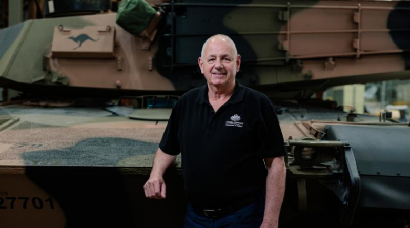 Andrew McAdie stands with the new M1A2 main battle tank at Bandiana North Barracks, Victoria. Story by Captain Krysten Clifton. Photo by Corporal Andrew Sleeman.