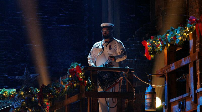 Able Seaman Musician Ritnarong Coomber performs during a Christmas show in Sydney. Photo by Kate Williams Photography.