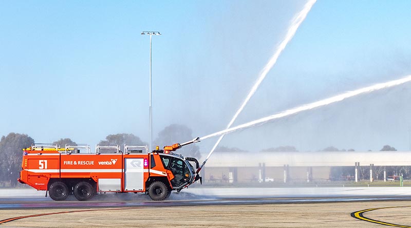 A Ventia firetruck conducts a firefighting demonstration at RAAF Base Pearce in Western Australia. Photo by Flying Officer Michael Thomas.