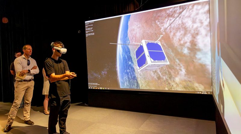 Exercise Western Dawn participants experience 'The 90° Wedge', a 3.8m diagonal 3D display at the HIVE (Hub for Immersive Visualisation and eResearch) at Curtin University, Perth. Story by Major Dean Benson. Photos by Corporal Nakia Chapman.