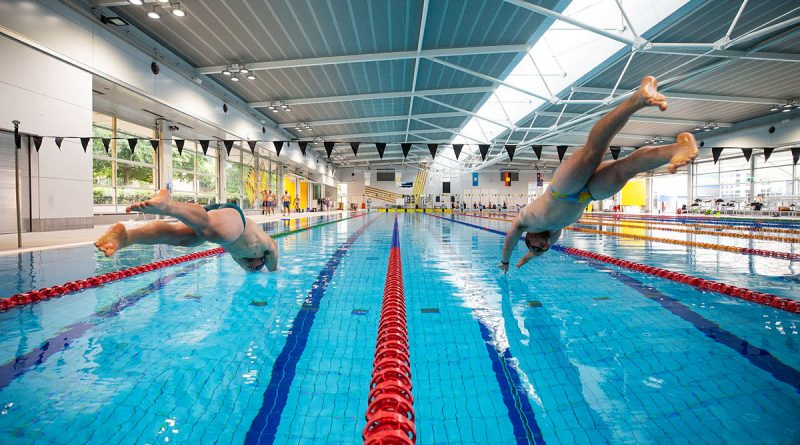 Invictus Games 2025 Team Australia competitors Callan McLean, right, and Jake Christie dive into the pool during a training camp at the Australian Institute of Sport, Canberra. Photo by Flight Sergeant Christopher Dickson.