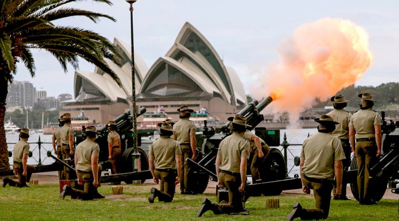 Army gunners from the 9th Regiment, Royal Australian Artillery, fire a 21-gun salute under the Sydney Harbour Bridge during Australia Day celebrations. Story by Lieutenant Marcus Middleton. Photo by Sergeant Tristan Kennedy.