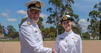 Navy pilot graduate Acting Sub Lieutenant Natika Dunn is awarded with ‘wings’ by Commander Fleet Air Arm Commodore Matthew Royals at 278 ADF Intermediate Pilots Course Graduation at 1 Flying Training School, RAAF Base East Sale. Photo by Flight Lieutenant Daina Sawade.