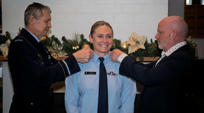 Royal New Zealand Air Force Group Captain Susie Barns is promoted to Air Commodore by Air Commander Australia Air Vice-Marshal Glen Braz, left, and her spouse Tom at her promotion and appointment to Deputy Air Commander Australia ceremony, held at the ADF Academy officers mess. Story by John Noble. Photo by Aircraftman Jakob Reid.