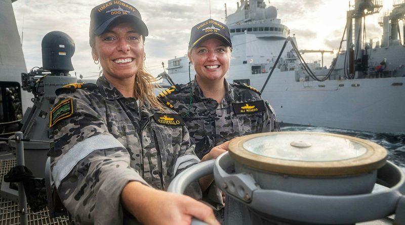 HMAS Hobart's Navigating Officer, Lieutenant Tori Costello, and Commanding Officer, Commander Alisha Withers, guide Hobart as it conducts a replenishment at sea during Exercise La Perouse. Story by Lieutenant Harrison Thomas. Photo by Leading Seaman Iggy Roberts.