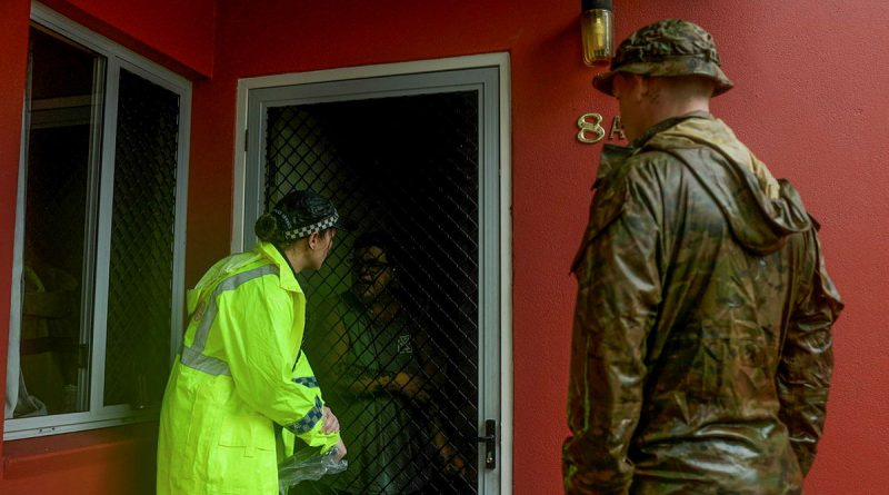 Soldiers from 3rd Battalion, Royal Australian Regiment, support the Queensland Police Service with door-knocking during severe weather in Townsville. Story by Major Diana Jennings. Photos by Corporal Riley Blennerhassett.