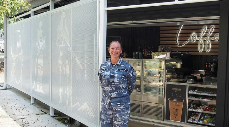 RAAF Base Amberley senior ADF officer Wing Commander Tanya Evans at the newly refurbished Army and Air Force Canteen Service AP2 kiosk.