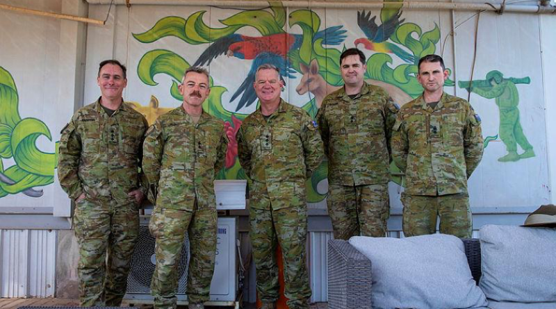 A small group of ADF personnel, including Commander of the Australian Contingent Colonel Mark Coyle, centre, close off Australia’s commitment to Operation Okra at Aussie House inside US military base Camp Arifjan, Kuwait. Story by Lieutenant Commander Max Logan.