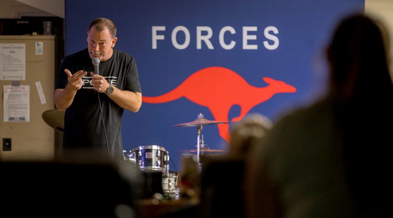 Stand-up comedian Anthony 'Lehmo' Lehmann performs at Camp Baird Headquarters in the Middle East for deployed ADF personnel during the Forces Entertainment Tour. Story and photo: byLeading Seaman Nadav Harel.