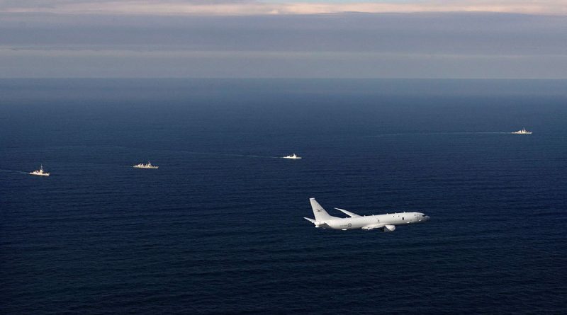 A RAAF P-8A Poseidon participates in a maritime cooperative activity with Royal Australian Navy's HMAS Hobart, Japan Maritime Self-Defense Force ship Akizuki, Philippine Navy ship BRP Jose Rizal and US Navy ship USS Benfold. Story by Lieutenant Harrison Thomas. Photo by Leading Seaman Iggy Roberts.