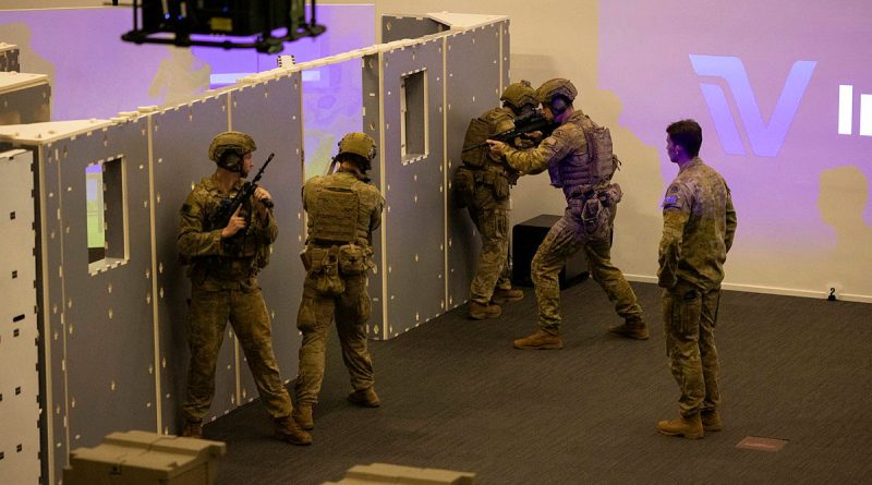 Soldiers from the 5th/7th Battalion, the Royal Australian Regiment, conduct a room clearance at the close-quarter battle area of the open-plan weapons training simulation system at Robertson Barracks in Darwin. Story and photos by Sergeant Matthew Bickerton.