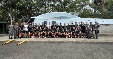 Personnel from Navy's Leadership Management Development Centre with NRL referees and staff at HMAS Penguin.