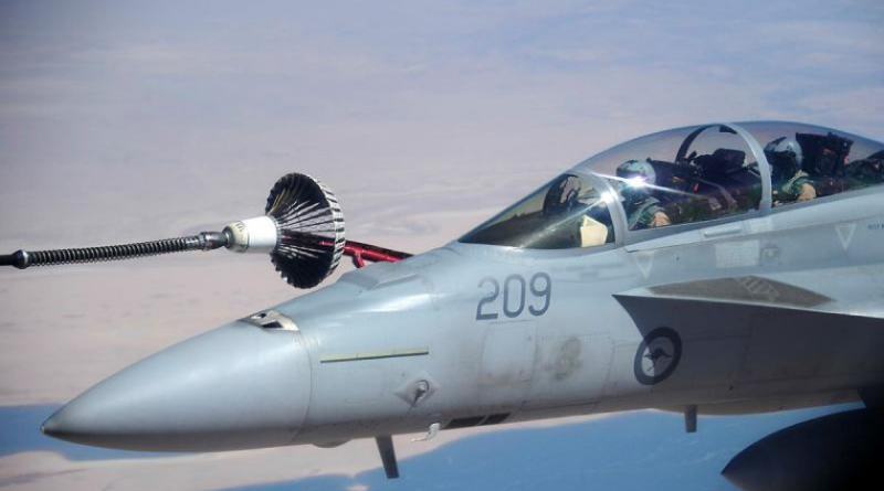 A Royal Australian Air Force F/A-18F Super Hornet aircraft receives fuel from a RAAF KC-30A Multi-Role Tanker Transport over Iraq as part of the Air Task Group for Operation Okra. Story by Warrant Officer Class 2 Max Bree. Photos by Sergeant Mick Davis.