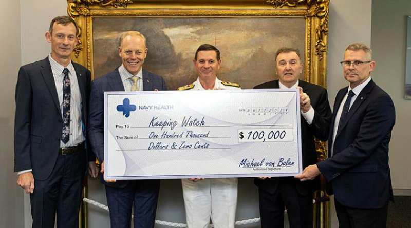 Chief of Navy Vice Admiral Mark Hammond accepts a cheque on behalf of Keeping Watch, for $100,000 from Navy Health at Russell Offices, Canberra Story by Lieutenant Commander Naomi Deignan.